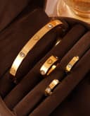 Set brazalete, anillo y aretes